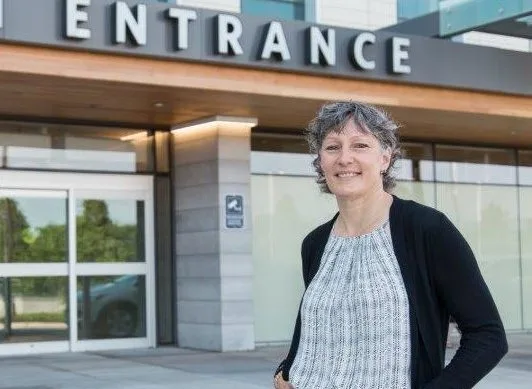 woman in front of hospital